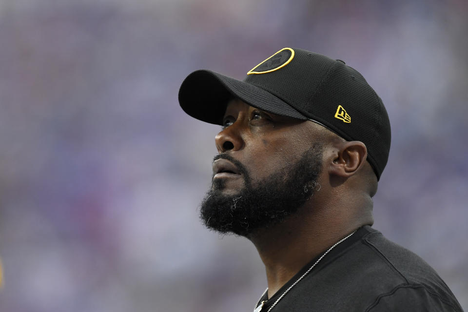 Pittsburgh Steelers' Mike Tomlin looks at the scoreboard during the second half of an NFL football game against the Buffalo Bills in Orchard Park, N.Y., Sunday, Sept. 12, 2021. (AP Photo/Joshua Bessex)