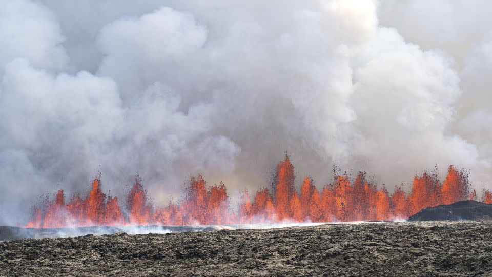 A volcano spews lava in Grindavík, Iceland, after a series of earthquakes. - Marco di Marco/AP