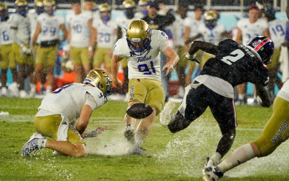 Tulsa kicker Chase Meyer (91) kicks an extra point during the fourth quarter in a game against Florida Atlantic at FAU Stadium on Saturday, October 7, 2023, in Boca Raton, FL.