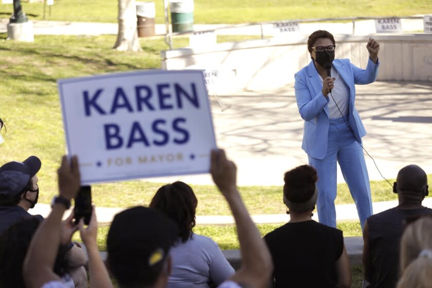 LOS ANGELES, CA - FEBRUARY 12, 2022 - - Rep. Karen Bass talks to constituents and volunteers who are collecting signatures to assure she's on the ballot in June for her campaign for mayor of Los Angeles in Pan Pacific Park on February 12, 2022. (Genaro Molina / Los Angeles Times)
