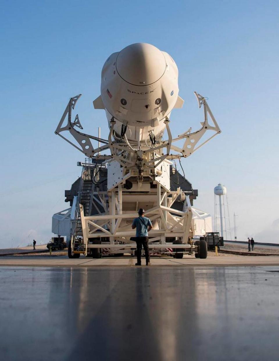 In this image released by NASA, a SpaceX Falcon 9 rocket with the company’s Crew Dragon spacecraft onboard is rolled out of the horizontal integration facility at Launch Complex 39A during preparations for the Crew-2 mission, on April 16, 2021, at Kennedy Space Center in Florida.