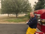 Oregon firefighter Steve McAdoo with Clackamas Fire talks on Sunday, Sept. 13, 2020, in Beavercreek, Ore., about spending long hours fighting wildfires while worrying about his own family, who had to evacuate. This year's fires have taxed the human, mechanical and financial resources of the nation's wildfire fighting forces to a degree that few past blazes did. And half of the fire season is yet to come. Heat, drought, and a strategic decision to attack the flames early combined with other factors to put a historically heavy burden on fire teams. (AP Photo/Lindsay Whitehurst)