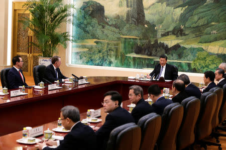 Chinese President Xi Jinping, speaks as he meets with U.S. Trade Representative Robert Lighthizer, second from left, U.S. Treasury Secretary Steven Mnuchin, left, and Chinese officials at the Great Hall of the People in Beijing, China February 15, 2019. Andy Wong/Pool via REUTERS