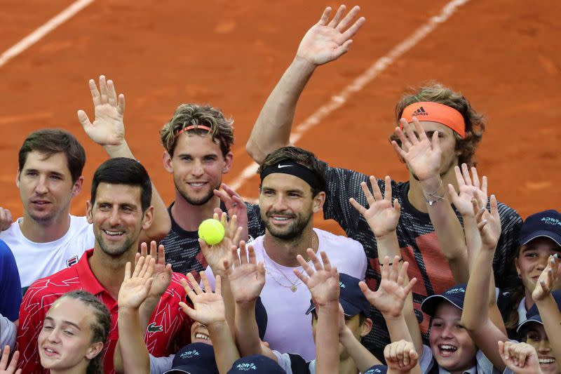 Bulgaria's Dimitrov, Serbia's Djokovic, Lajovic, Austria's Thiem, Germany's Zverev pose for a photo with the ballkids during Adria Tour at Novak Tennis Centre in Belgrade