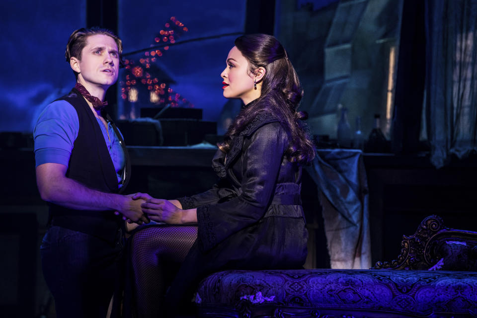 Aaron Tveit, left, appears with Karen Olivo during a performance of "Moulin Rouge! The Musical," in New York. Tveit was the only actor nominated for a Tony in the category of best leading actor in a musical for his role. (Matthew Murphy/Boneau/Bryan-Brown via AP)