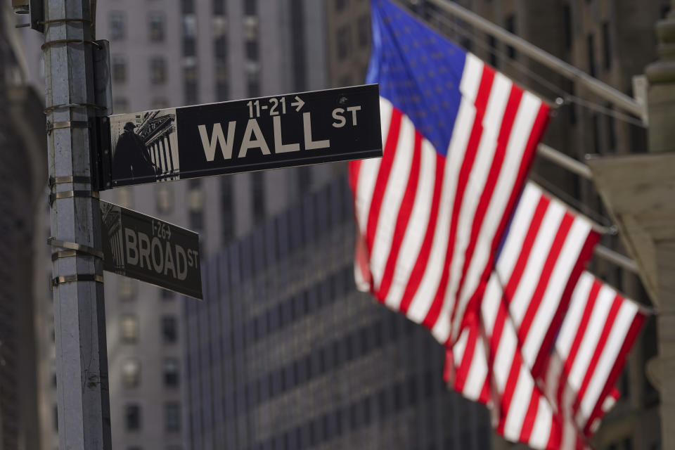 FILE - American flags fly outside the New York Stock Exchange, Friday, Sept. 23, 2022, in New York. The latest round of corporate earnings is leaving Wall Street with a confounding sense of relief and lingering anxiety. Companies are in the midst of an &#x00201c;earnings recession,&#x00201d; meaning profits have contracted for two straight quarters, starting with a 4.6% drop at the end of 2022. (AP Photo/Mary Altaffer, File)