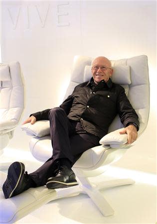 Natuzzi Group's CEO and President Pasquale Natuzzi poses for a photo in a store downtown Milan December 10, 2013. REUTERS/Alessandro Garofalo