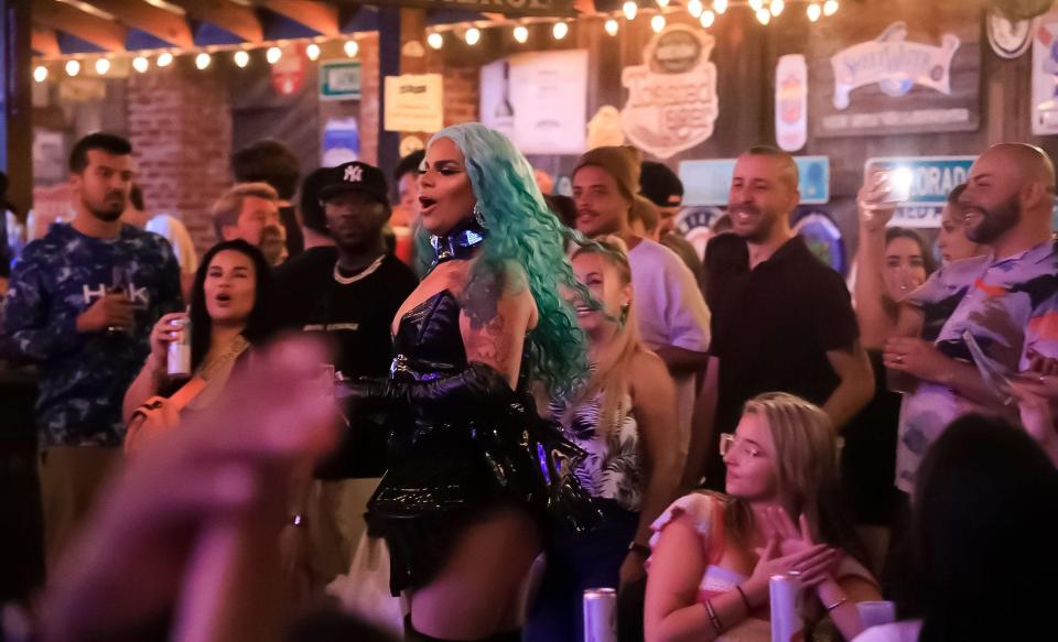 Lia Zoe performs in front of a packed house at Cafe DaVinci, March 28, 2023. The venue hosts Pride night every Tuesday.
