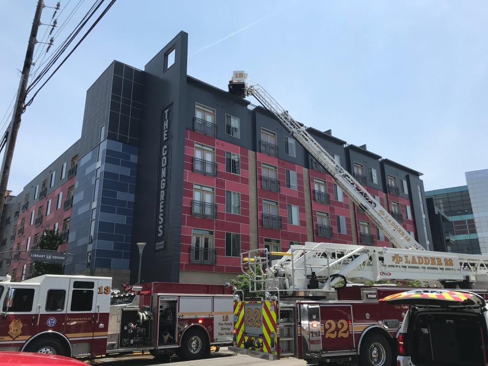 An Indianapolis Fire Department ladder truck is seen outside The Congress apartment complex about 1:30 p.m. Thursday, May 12, 2022.