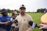 New Orleans Saints offensive coordinator Clint Kubiak talks to reporters after an NFL rookie minicamp football practice in Metairie, La., Saturday, May 11, 2024. (AP Photo/Gerald Herbert)
