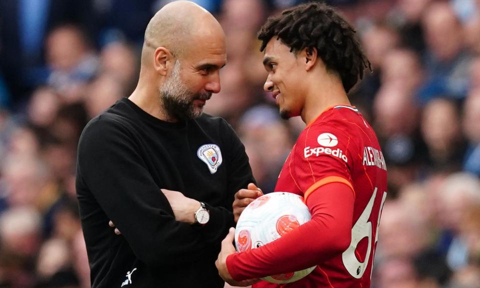 <span>Pep Guardiola and <a class="link " href="https://sports.yahoo.com/soccer/players/591019/" data-i13n="sec:content-canvas;subsec:anchor_text;elm:context_link" data-ylk="slk:Trent Alexander-Arnold;sec:content-canvas;subsec:anchor_text;elm:context_link;itc:0">Trent Alexander-Arnold</a> chat on the touchline in April 2022.</span><span>Photograph: Martin Rickett/PA</span>