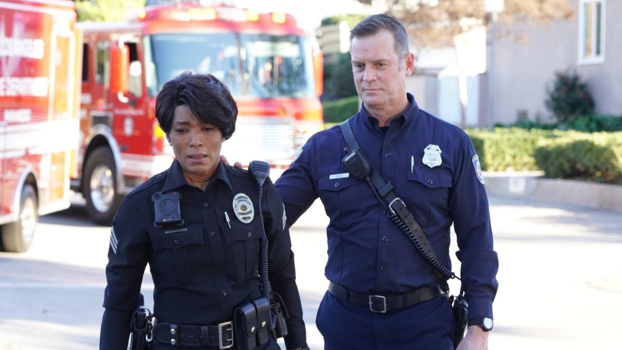  Athena and Bobby in uniform on 9-1-1 