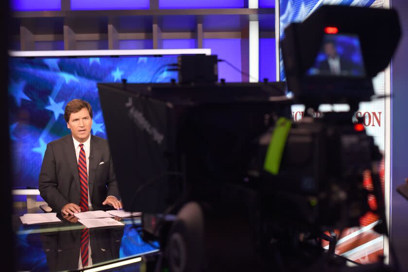 MANHATTAN, NEW YORK, OCTOBER 1, 2018 Tucker Carlson is seen in the studio on the set of his show on FOX News in Manhattan, NY. After flicking out at CNN and MSNBC, Carlson now has the most successful show on Fox News. He also has a new book that serves as a viewer guide to his show, Ship of Fools that comes out this week. 10/1/2018 Photo by Jennifer S. Altman/For The Times