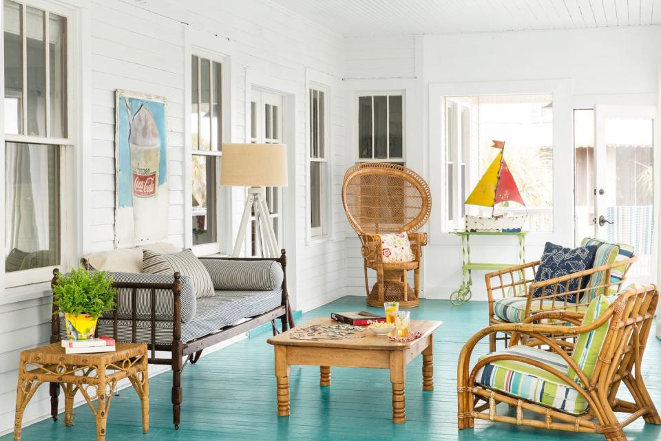 coastal sunroom with blue painted floor