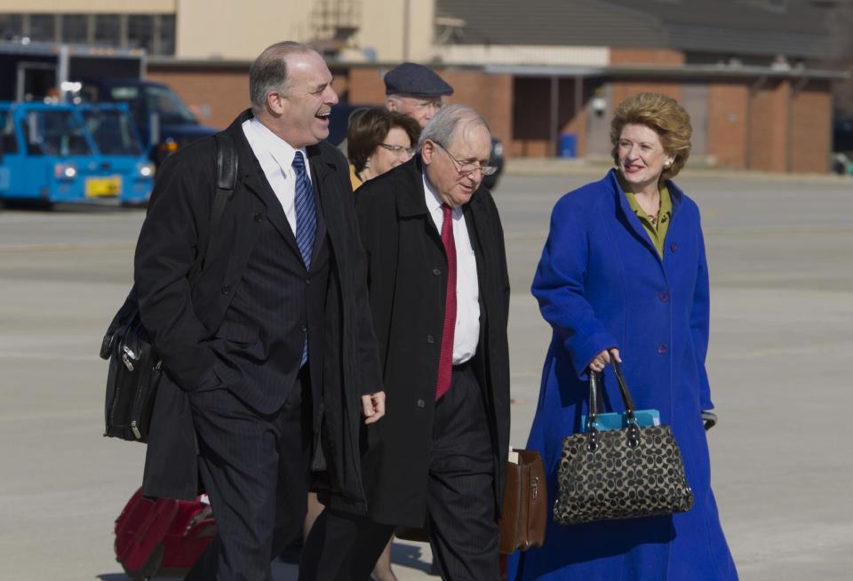 From left, Rep. Dan Kildee D-Mich., Sen. Carl Levin D-Mich., and Senate Agriculture Committee Chair Sen. Debbie Stabenow D-Mich., walk toward Air Force One before President Barack Obama's arrival, Friday, Feb. 7, 2014, at Andrews Air Force Base, Md. The group traveled with the president to East Lansing, Mich. where the president was to sign the farm bill at Michigan State University. ( AP Photo/Jose Luis Magana)