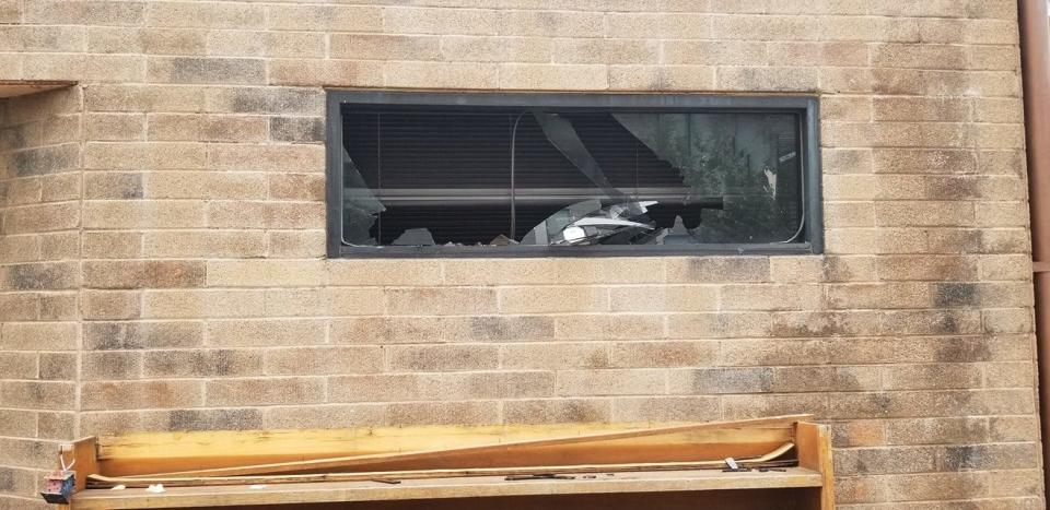 The Tucson Police Department is investigating a incident in which a a group of people is suspected of punching a man and breaking a window at the Islamic Center of Tucson on Saturday morning, just before 6:30 a.m.