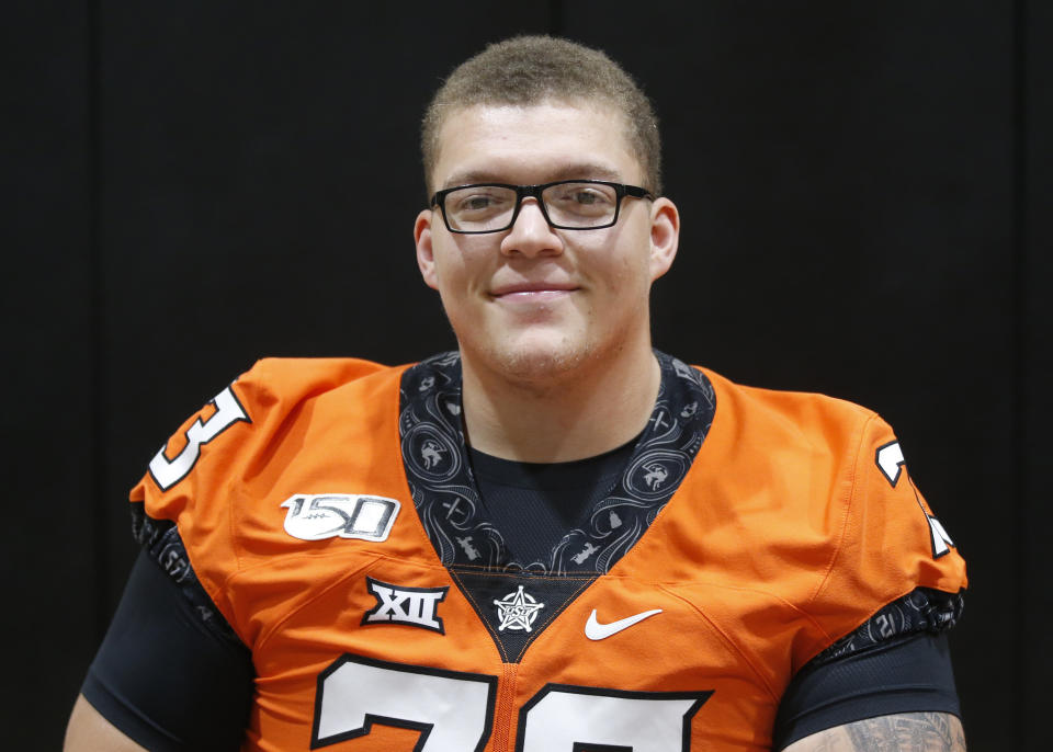 FILE - Oklahoma State offensive lineman Teven Jenkins is pictured during an NCAA college football media day in Stillwater Okla., in this Saturday, Aug. 3, 2019, file photo. Jenkins is a possible first round pick in the NFL Draft, April 29-May 1, 2021, in Cleveland.(AP Photo/Sue Ogrocki, File)