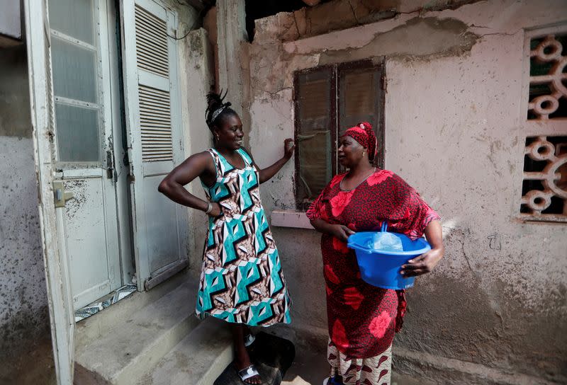 Wider Image: Meet Senegal's first female pro surfer inspiring girls to take to the waves