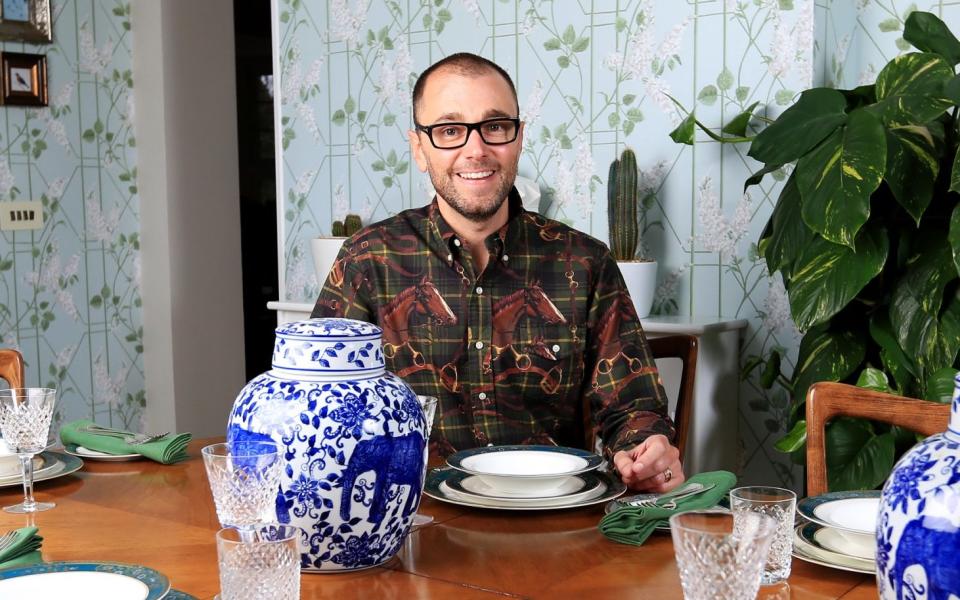 Nicky Rampley-Clarke is seen in the dining room at his home in Surrey