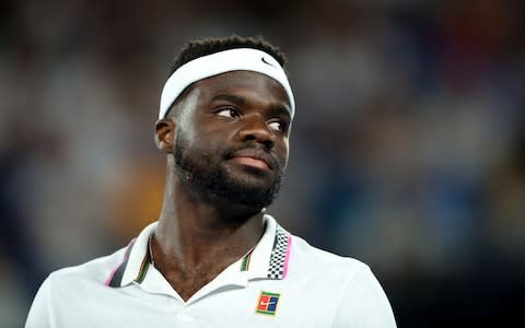 Frances Tiafoe of the United States looks on in his quarter final match against Rafael Nadal of Spain during day nine of the 2019 Australian Open at Melbourne Park on January 22, 2019 in Melbourne, Australia - Credit: Getty Images