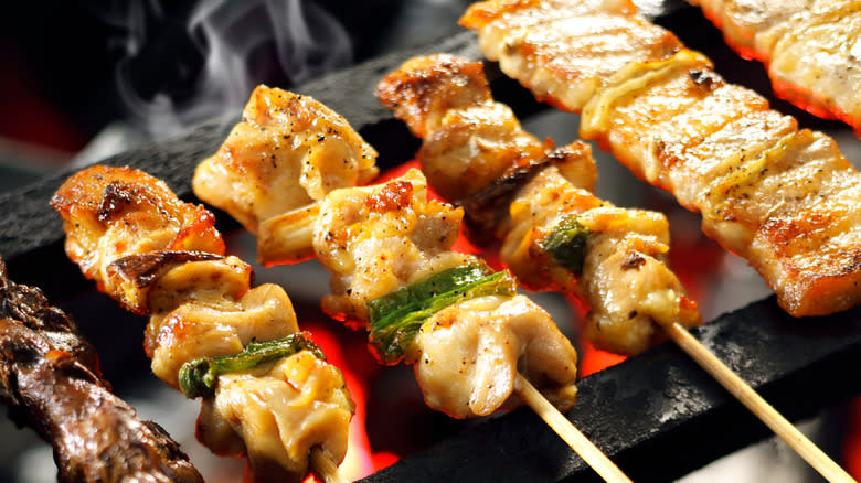 Chicken skewers on a hot grill