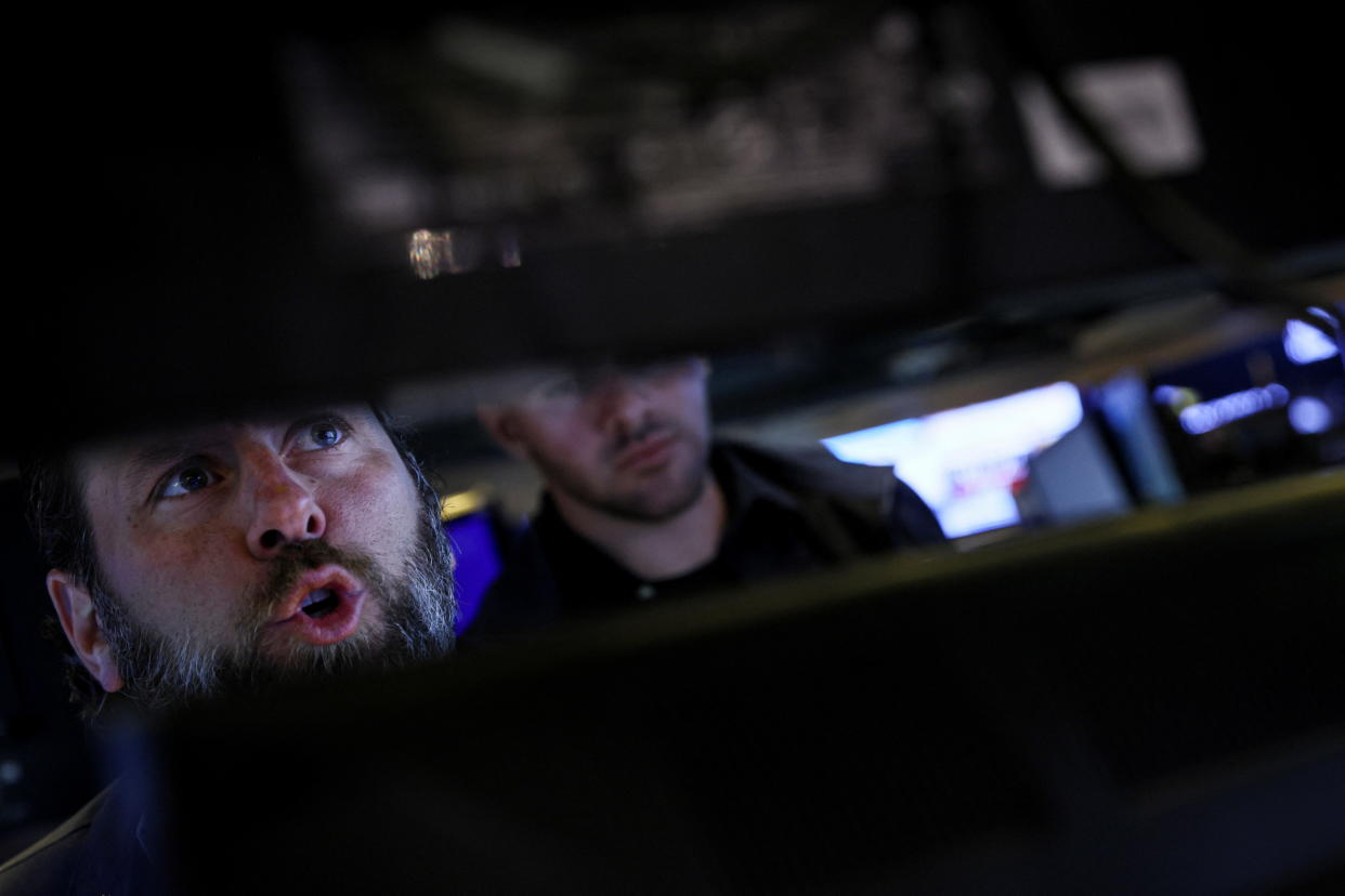 Specialist traders work inside a booth on the floor of the New York Stock Exchange (NYSE) in New York City, U.S., June 3, 2022.  REUTERS/Brendan McDermid