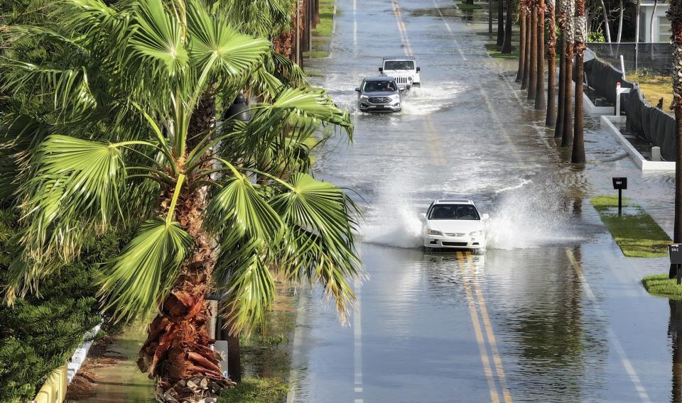 Streets across Florida, including near St. Pete Beach, flooded as Hurricane Helene made landfall