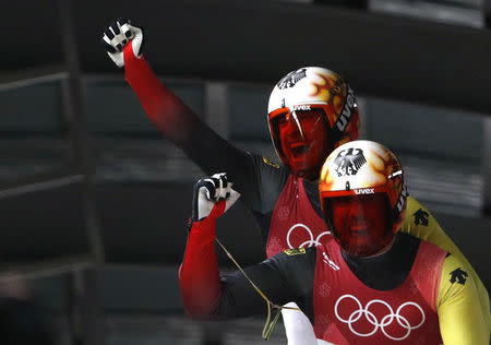 Luge - Pyeongchang 2018 Winter Olympics - Men's Doubles Competition - Olympic Sliding Centre - Pyeongchang, South Korea - February 14, 2018. Tobias Wendl and Tobias Arlt of Germany celebrate winning gold. REUTERS/Edgar Su