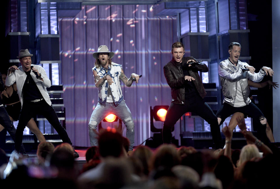 Brian Littrell, left, and Nick Carter, second from right, of Backstreet Boys, and Brian Kelley, second left, and Tyler Hubbard, right, of Florida Georgia Line, perform at the 52nd annual Academy of Country Music Awards at the T-Mobile Arena on Sunday, April 2, 2017, in Las Vegas. (Photo by Chris Pizzello/Invision/AP)