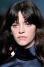 <p>Red and white marble monocle earring at the Roksanda FW18 show. (Photo: Getty) </p>