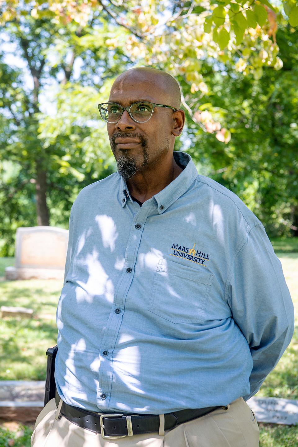 Jonathan McCoy, a history professor at Mars Hill University, at the Historic Mount Olive Cemetery August 23, 2023.