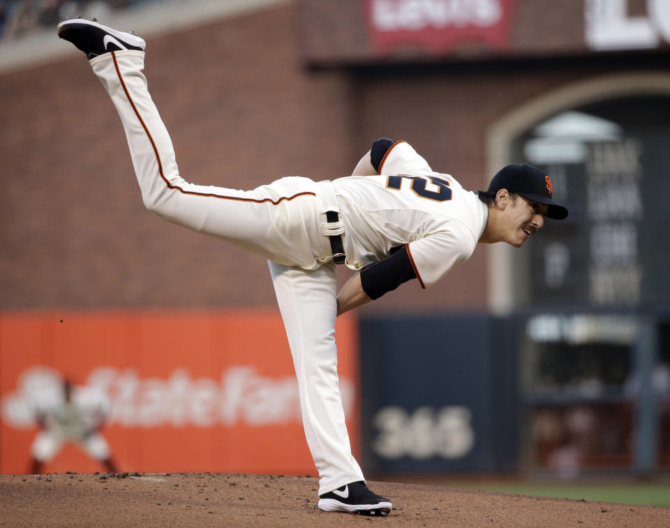 San Francisco Giants starting pitcher Tim Lincecum follows through on a delivery to the Los Angeles Dodgers during the first inning of a baseball game Tuesday, April 15, 2014, in San Francisco. (AP Photo/Marcio Jose Sanchez)