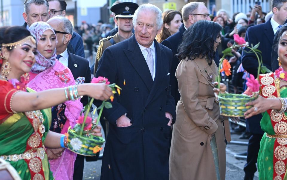 The King was praised for his willingness to listen to multicultural Britain - Eddie Mulholland