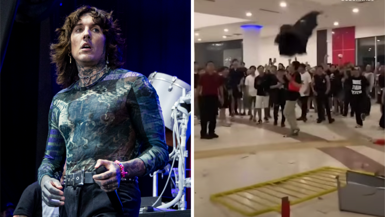  Photos of Oli Sykes and fans rioting. 