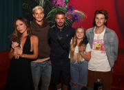 <p>David and Victoria Beckham bring kids Romeo, Harper and Cruz to the star-studded opening of David Grutman and Bad Bunny's Gekko restaurant in Miami on Aug. 11. </p>