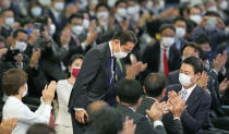 Japan’s former Foreign Minister Fumio Kishida bows as he won in the Liberal Democrat Party leadership election in Tokyo Wednesday, Sept. 29, 2021. Kishida has won the governing party leadership election and is set to be become the next prime minister. (Kyodo News via AP)