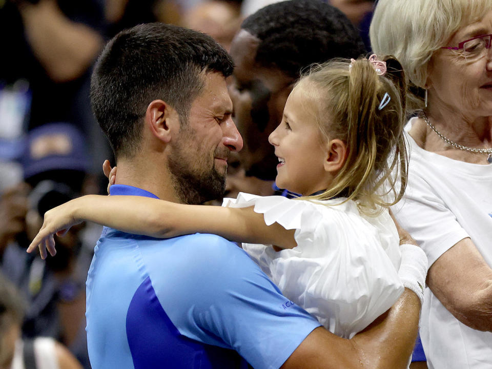 Novak Djokovic of Serbia celebrates with daughter Tara after defeating Daniil Medvedev of Russia during their men's singles final match at the 2023 U.S. Open, September 10, 2023 in New York City. / Credit: Matthew Stockman/Getty Images