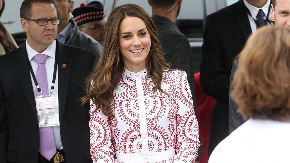 Kate Middleton wearing a white and red dress 