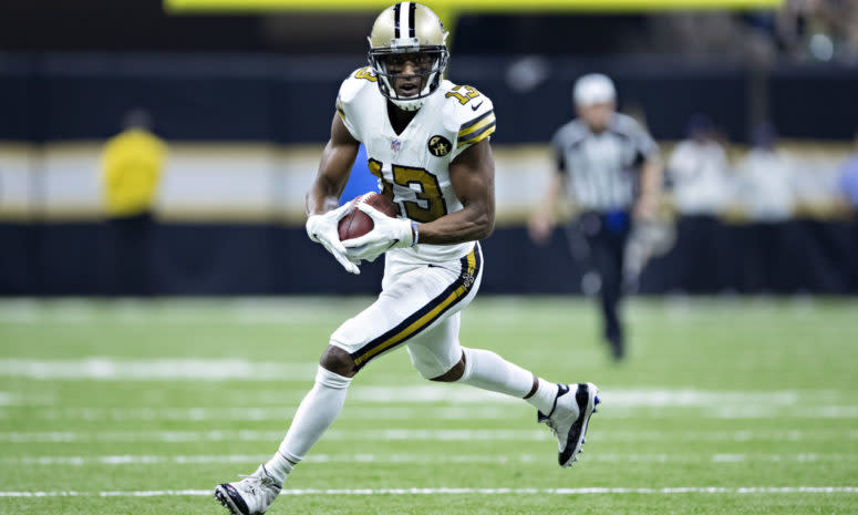 Michael Thomas running with the football during a game.