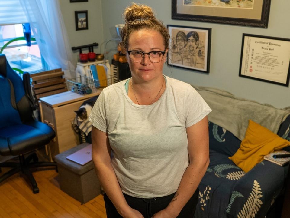 Erin Hobson and her spouse have been looking to move into a bigger rental unit for the past two years. So far, they haven't had any luck.  (Francis Ferland/CBC - image credit)