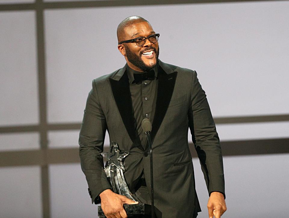 Taraji P. Henson praised Tyler Perry for creating opportunities for people of color – and paying them fairly – as she honored him at the BET Awards.