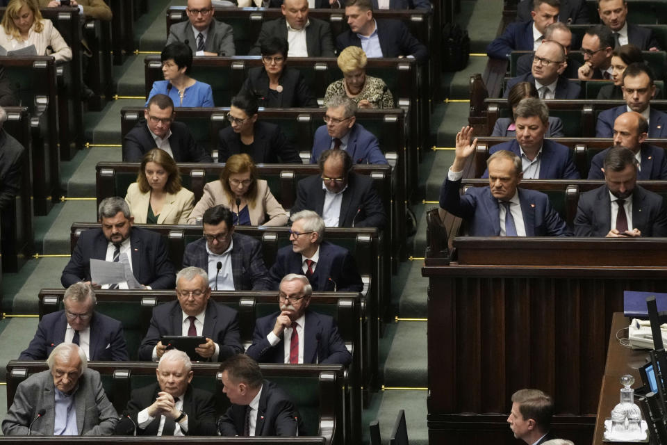 Members of Poland's parliament vote on a proposal to liberalize Poland's strict abortion law, in Warsaw, Poland, on Friday, April 12, 2024. Polish lawmakers voted Friday to continue work on four proposals that would loosen the law on abortion, a divisive issue in the traditionally Roman Catholic country which has a near-total ban. (AP Photo/Czarek Sokolowski)