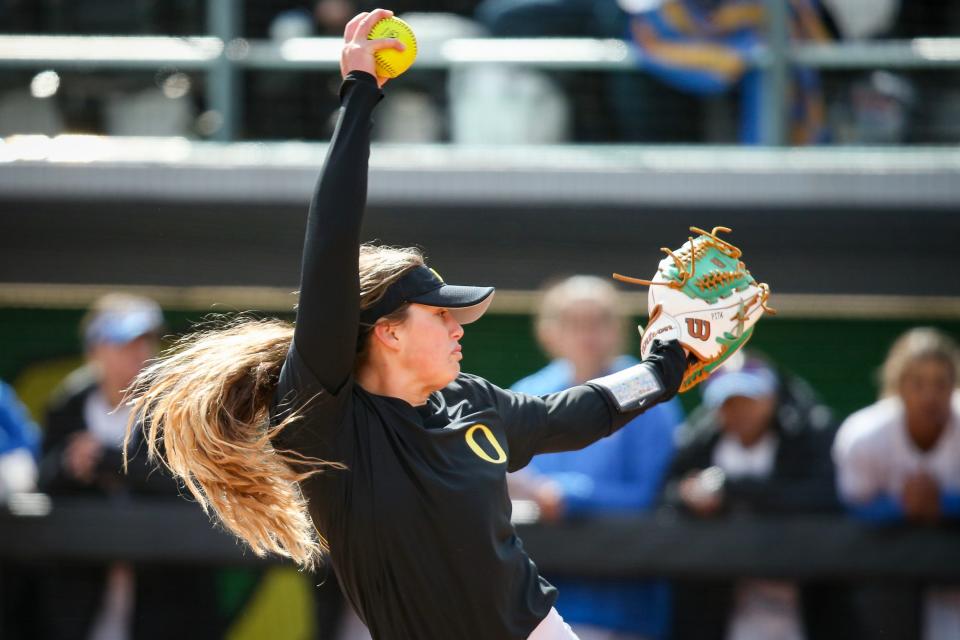 Oregon right-handed pitcher Stevie Hansen winds up as the Oregon Ducks fell to UCLA 7-4 on March 25, 2023, at Jane Sanders Stadium in Eugene.