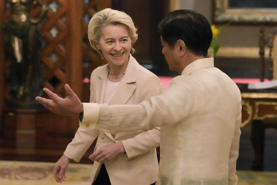 Philippine President Ferdinand Marcos Jr., right, gestures beside European Commission President Ursula von der Leyen during her visit at the Malacanang Presidential Palace in Manila, Philippines, Monday, July 31, 2023. (AP Photo/Aaron Favila, Pool)