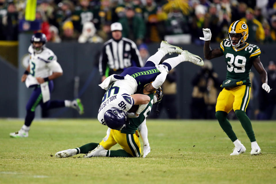 After admitting they got it wrong, NFL officials still allowed a bad call to stand and further punished the Packers by docking them a challenge. (Gregory Shamus/Getty Images)