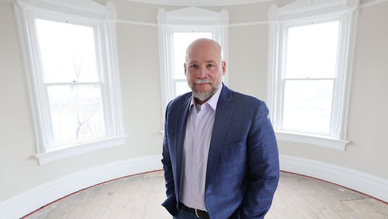 Dave Durocher, executive director of The Other Side Academy, poses in the Armstrong Mansion on the TOSA campus in Salt Lake City on Wednesday, March 29, 2023. The organization works with former prisoners hoping to rehabilitate their lives.