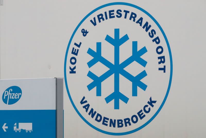 A logo is seen on a refrigerated truck leaving the Pfizer plant in Puurs