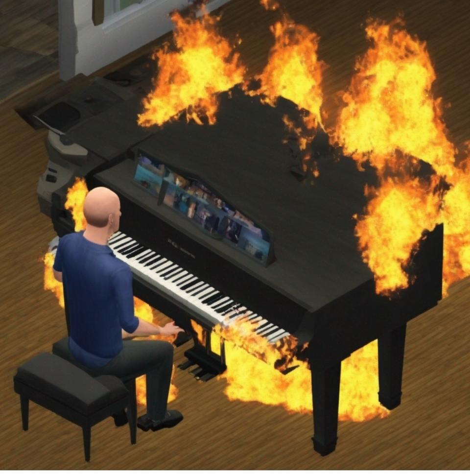 A character from The Sims video game plays a piano that's on fire