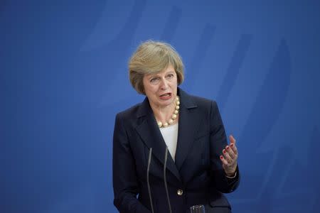 British Prime Minister Theresa May addresses a news conference following talks with German Chancellor Angela Merkel at the Chancellery in Berlin, Germany July 20, 2016. REUTERS/Hannibal Hanschke