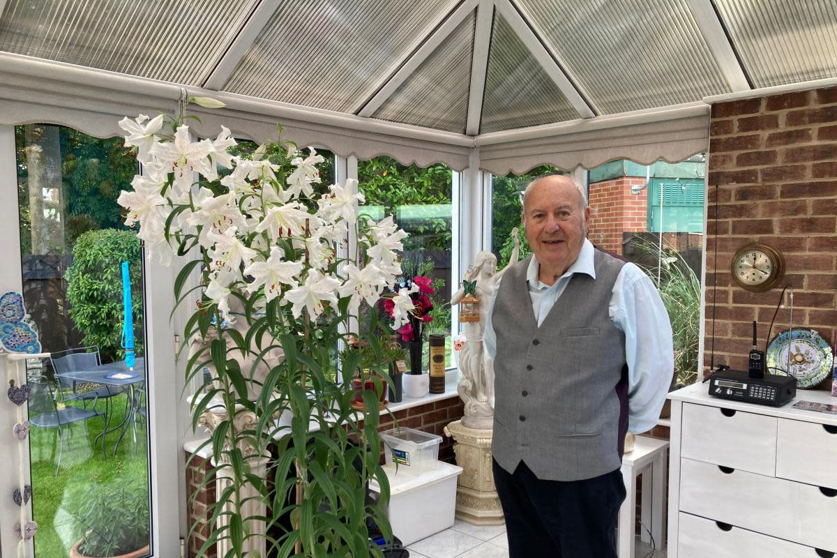 Charles Johnson with his mystery flowers <i>(Image: Northern Echo)</i>
